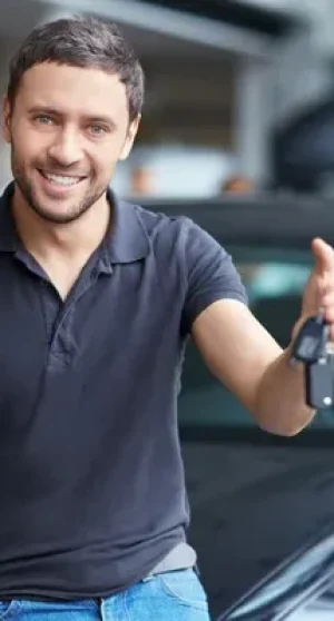 depositphotos_12751225-stock-photo-man-with-car-keys (1)